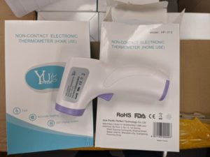 picture of a non-contact thermometer and its packaging 