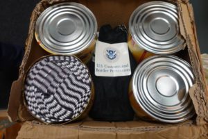 Top view of coffee cans in a box