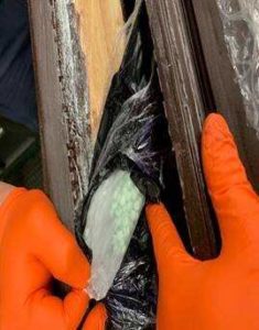 Fentanyl hidden
inside of a picture frame. (Source: CBP in Memphis, TN)