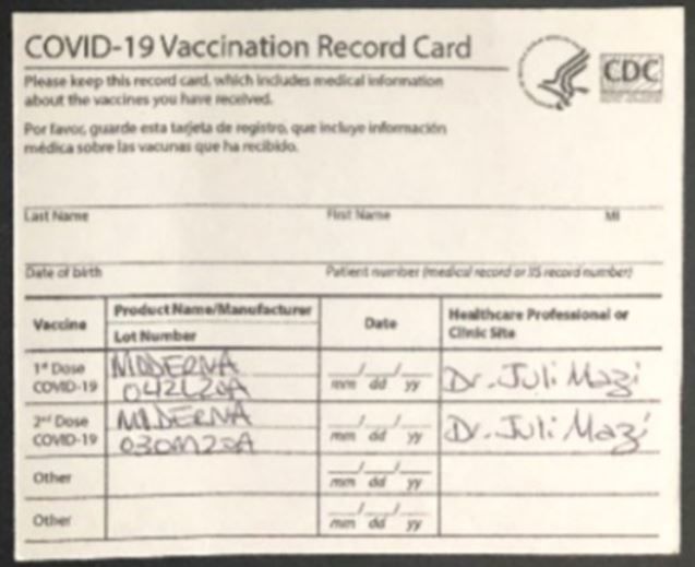 fuzzy picture of a forged vaccine card
