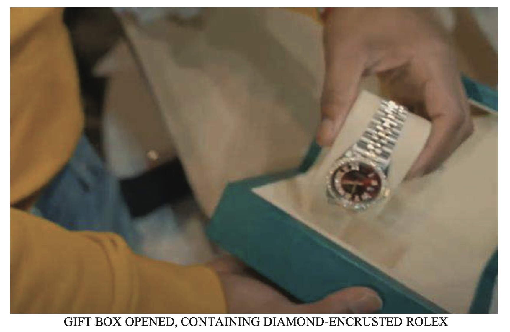 This picture of a diamond-encrusted Rolex is one of many interesting images that appear in the Caruso case's criminal complaint 