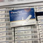 Boxes labeled as Flowflex COVID test kits