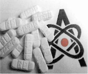 White rectangular pills next to a logo