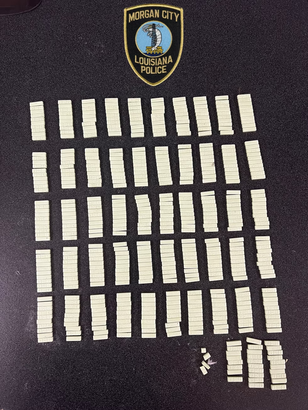 Alprazolam (Xanax) bars laid out on a table with a Morgan City Police Department above them.