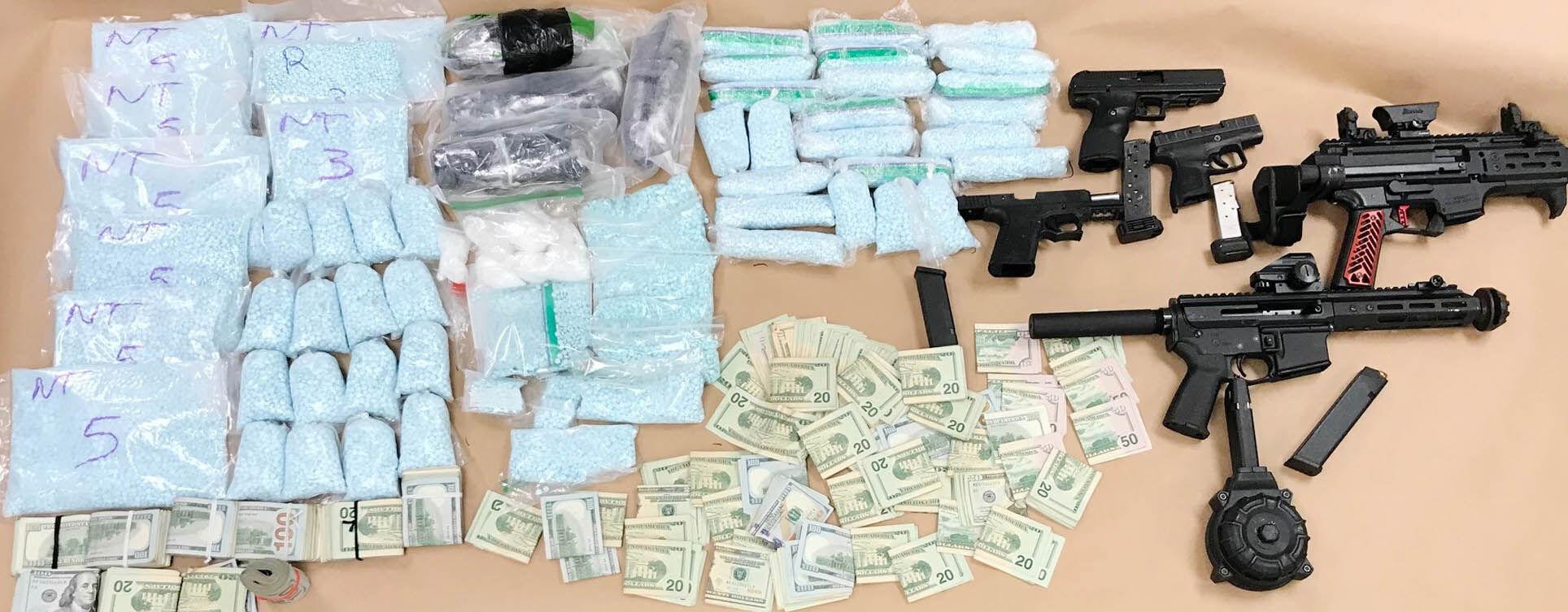 Law enforcement seized drugs, guns and cash in March 2022 in Mount Vernon, Washington.

