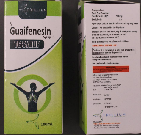 Close up of boxes of guaifenesin syrup,
