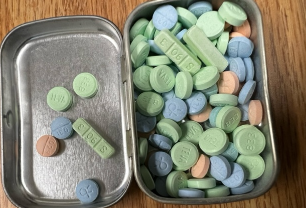 A tin of counterfeit pills seized in Clarkston, Washington in June 2023. (Quad Cities Drug Task Force)