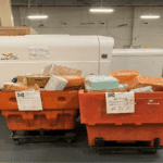 Large orange carts filled with seized items