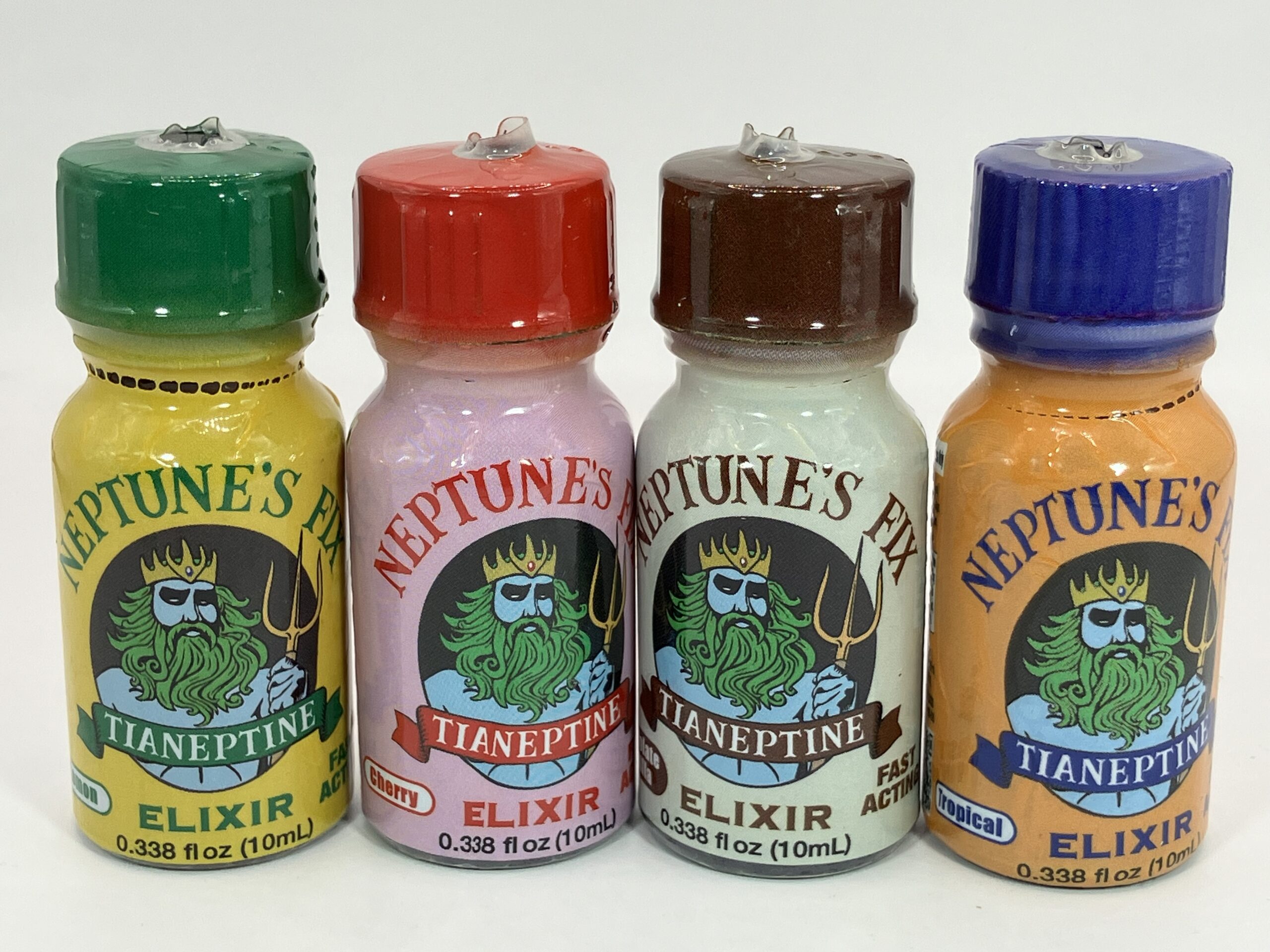 A closeup of brightly colored supplement bottles with "Neptune's Fix" labels