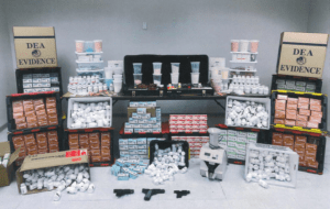 Pharmaceuticals laid out on a table as DEA evidence
