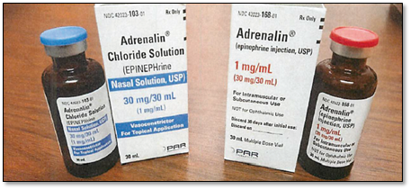 Epinephrine-FDA-1-2025 two bottles of medicine and the boxes they come in